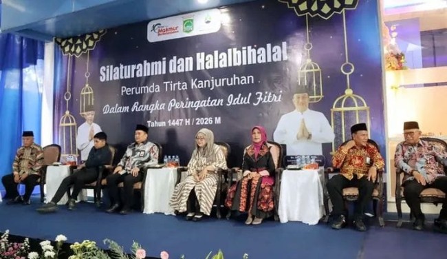 Banner Halalbihalal Perumda Tirta Kanjuruhan.